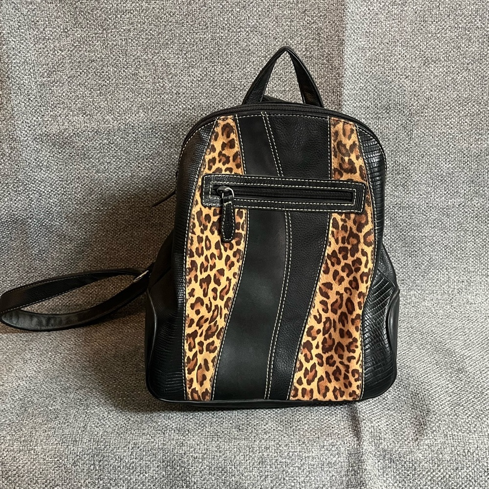 Never used leather and leopard backpack!